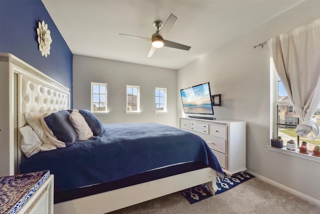 bedroom with carpet flooring, ceiling fan, and baseboards