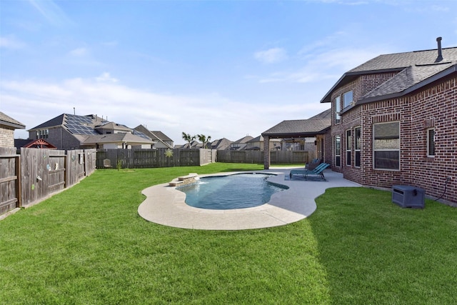 view of swimming pool with a yard, a fenced backyard, and a patio