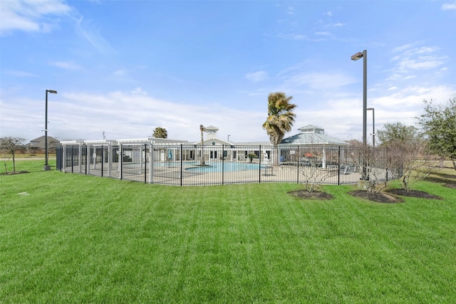 surrounding community featuring a patio, fence, a pool, a yard, and a gazebo