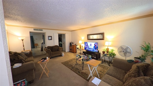 carpeted living room with a textured ceiling, ornamental molding, and visible vents