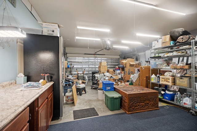 garage with freestanding refrigerator