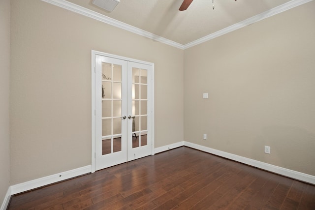 empty room featuring baseboards, visible vents, dark wood-style floors, crown molding, and french doors