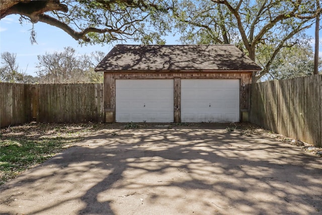 detached garage with fence