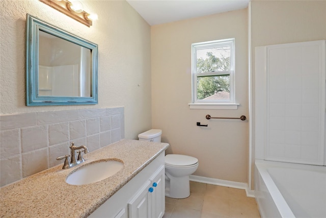 full bath with tile patterned flooring, baseboards, vanity, and toilet