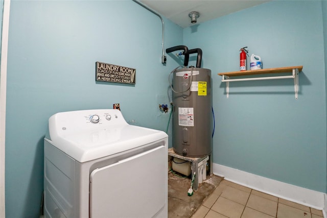 washroom with washer / clothes dryer, water heater, laundry area, baseboards, and tile patterned floors