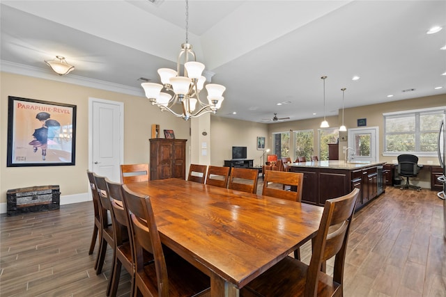 dining area featuring visible vents, baseboards, dark wood finished floors, crown molding, and recessed lighting