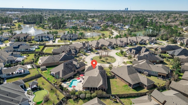 aerial view featuring a water view and a residential view