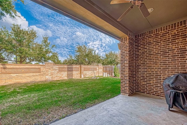 view of patio featuring a ceiling fan, a fenced backyard, and a grill