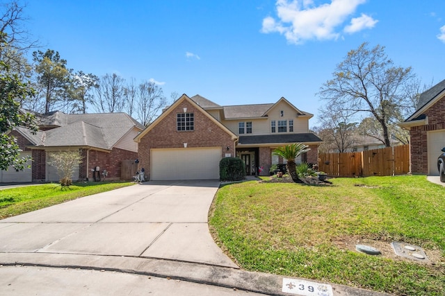 traditional-style house featuring brick siding, a front lawn, fence, a garage, and driveway