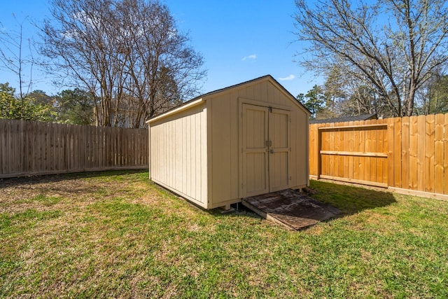 view of shed featuring a fenced backyard