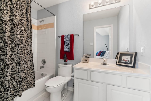 full bath with tile patterned flooring, vanity, toilet, and shower / tub combo with curtain