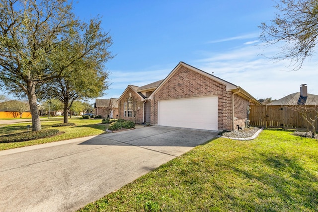 view of front of house with brick siding, a garage, concrete driveway, and a front yard