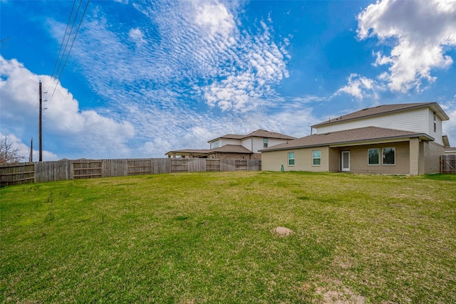 view of yard featuring a fenced backyard