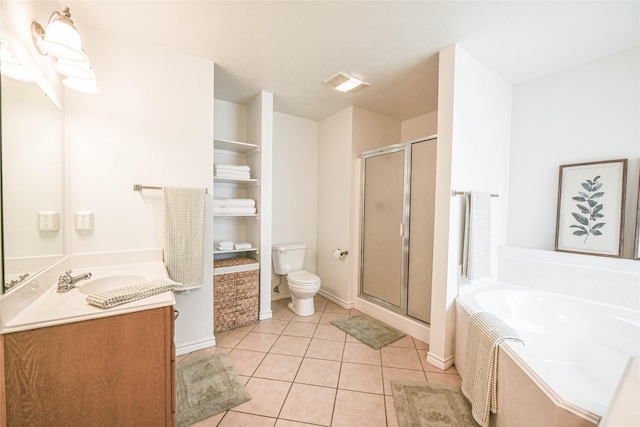 bathroom featuring tile patterned flooring, visible vents, a shower stall, and toilet