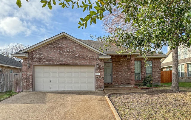 ranch-style house featuring a garage, brick siding, fence, and driveway