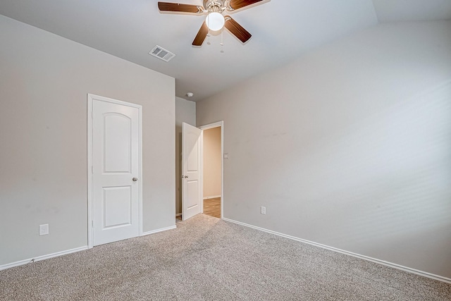 unfurnished bedroom with carpet, visible vents, ceiling fan, and baseboards