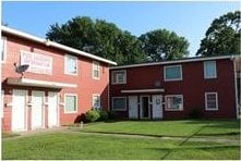 exterior space with a garage and a front yard