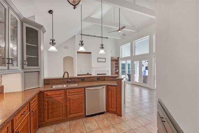 kitchen featuring beamed ceiling, a ceiling fan, a sink, a peninsula, and dishwasher