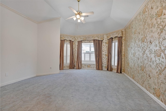 spare room with wallpapered walls, carpet, baseboards, and ornamental molding