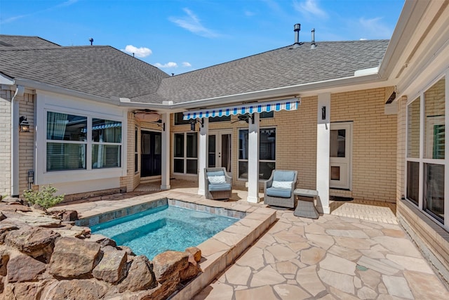 exterior space with french doors and a patio