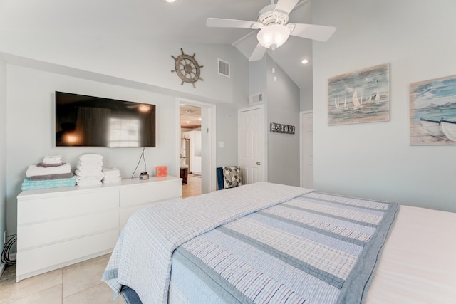 bedroom with a ceiling fan, visible vents, vaulted ceiling, and light tile patterned floors