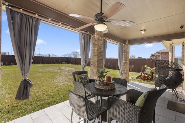 view of patio / terrace featuring ceiling fan and a fenced backyard