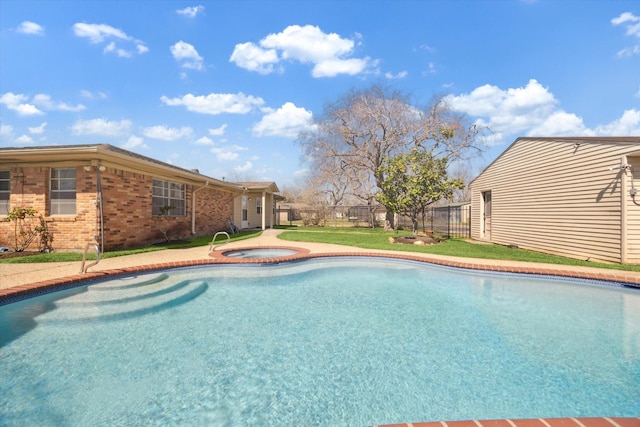 view of swimming pool featuring fence and an in ground hot tub