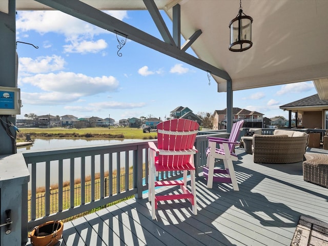 wooden terrace with a water view