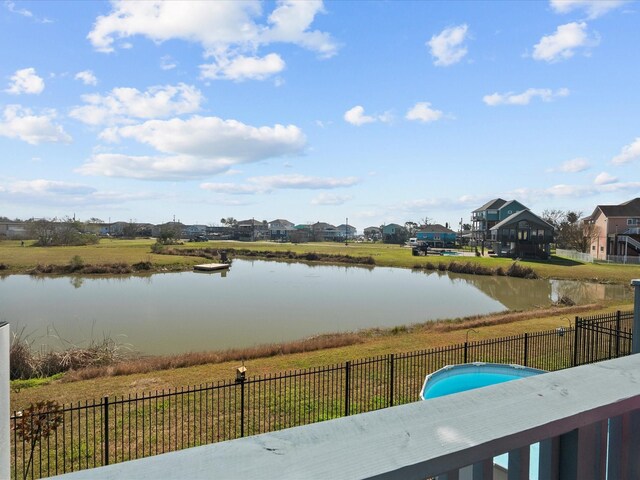 view of water feature with a fenced backyard