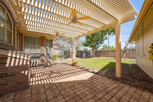 view of patio / terrace featuring ceiling fan, a fenced backyard, and a pergola