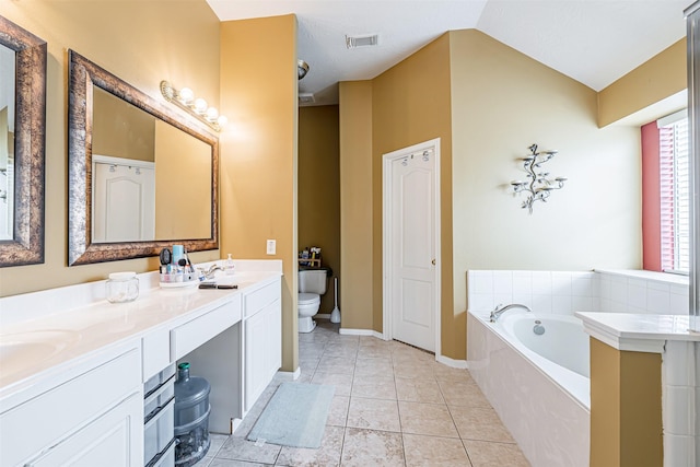 full bathroom with double vanity, visible vents, toilet, tile patterned flooring, and a bath