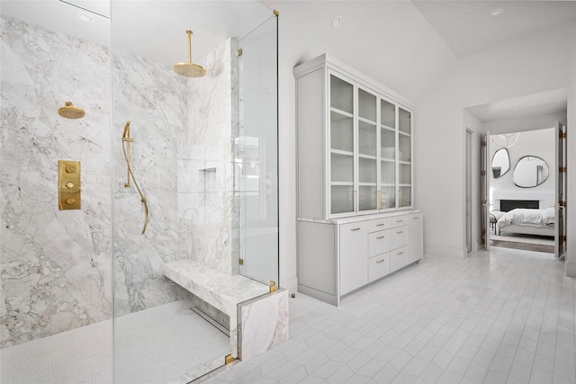 full bathroom with ensuite bath, a marble finish shower, and a fireplace