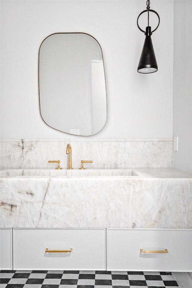 bathroom with tile patterned floors