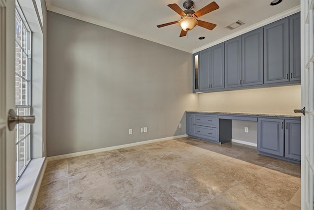 unfurnished office with visible vents, baseboards, built in study area, ceiling fan, and ornamental molding