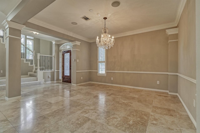 empty room featuring a healthy amount of sunlight, decorative columns, and visible vents