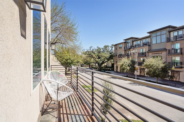 balcony featuring a residential view