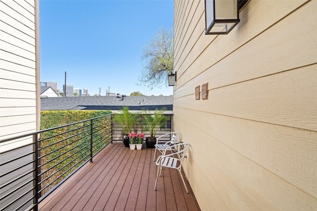 wooden terrace with a view of city