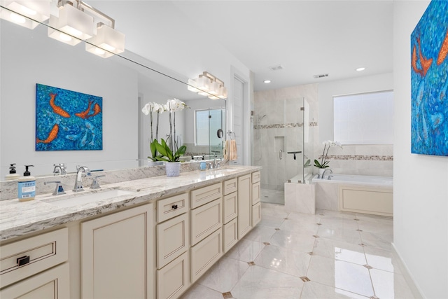 bathroom featuring a sink, visible vents, a bath, tile patterned floors, and a stall shower