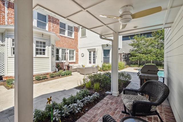 view of patio / terrace featuring an outdoor hangout area, area for grilling, ceiling fan, and fence