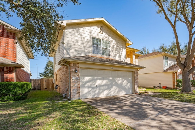 traditional home featuring brick siding, concrete driveway, fence, a garage, and a front lawn