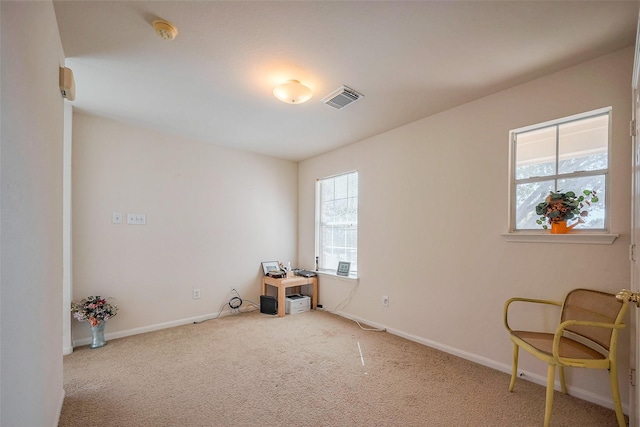 misc room with carpet flooring, visible vents, and baseboards