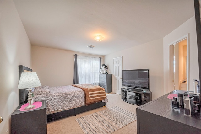 carpeted bedroom with visible vents