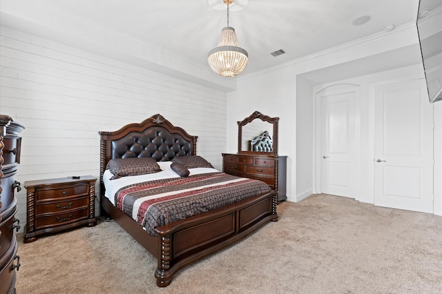 bedroom with ornamental molding, light colored carpet, visible vents, and an inviting chandelier