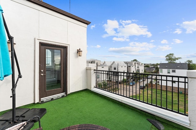 balcony featuring a residential view