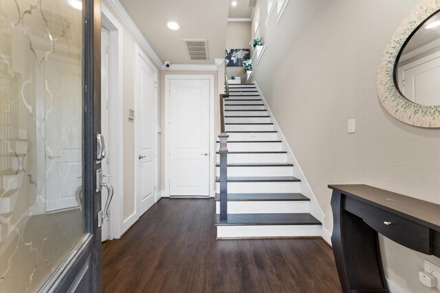 foyer with baseboards, visible vents, dark wood finished floors, stairway, and recessed lighting