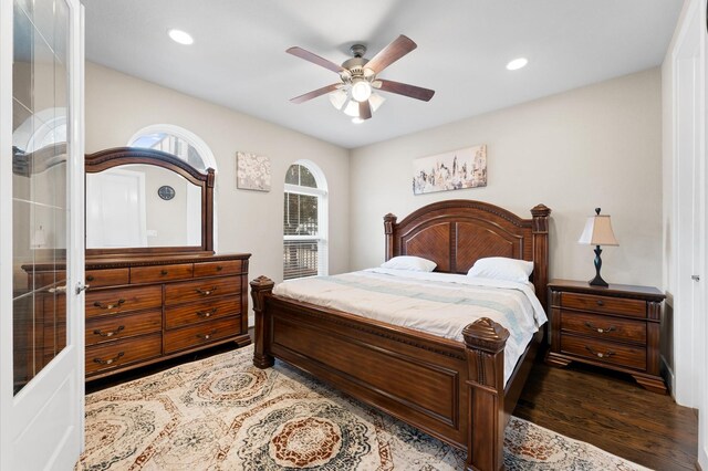 bedroom featuring ceiling fan, wood finished floors, and recessed lighting