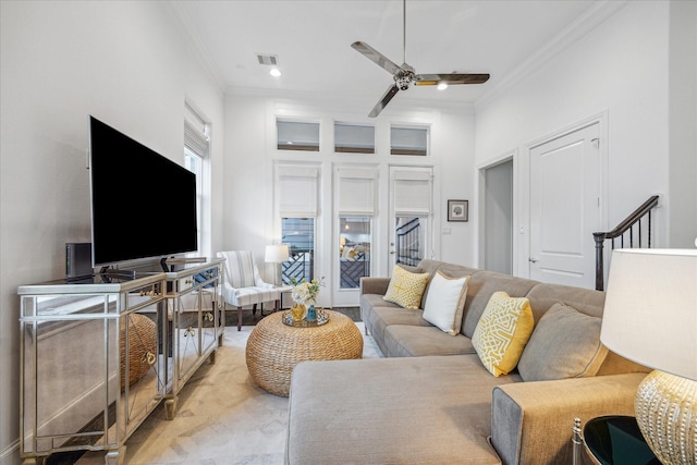 living area with crown molding, recessed lighting, visible vents, stairway, and a ceiling fan