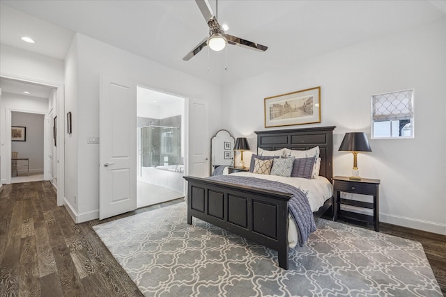 bedroom featuring recessed lighting, ensuite bathroom, ceiling fan, wood finished floors, and baseboards