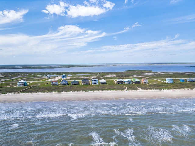 aerial view featuring a water view and a view of the beach