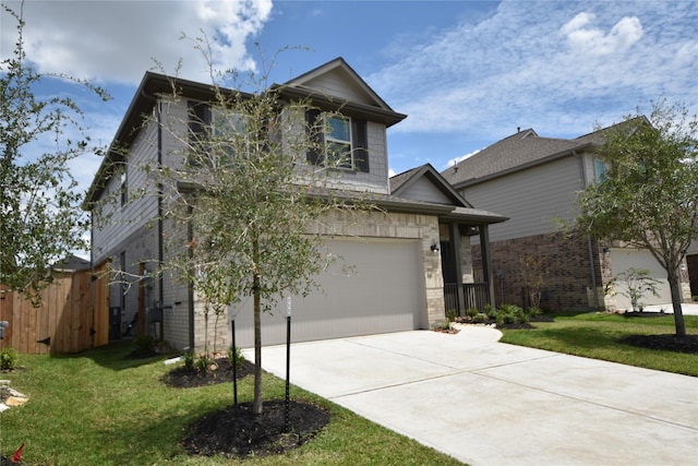 view of front of home featuring driveway, brick siding, fence, and a front yard